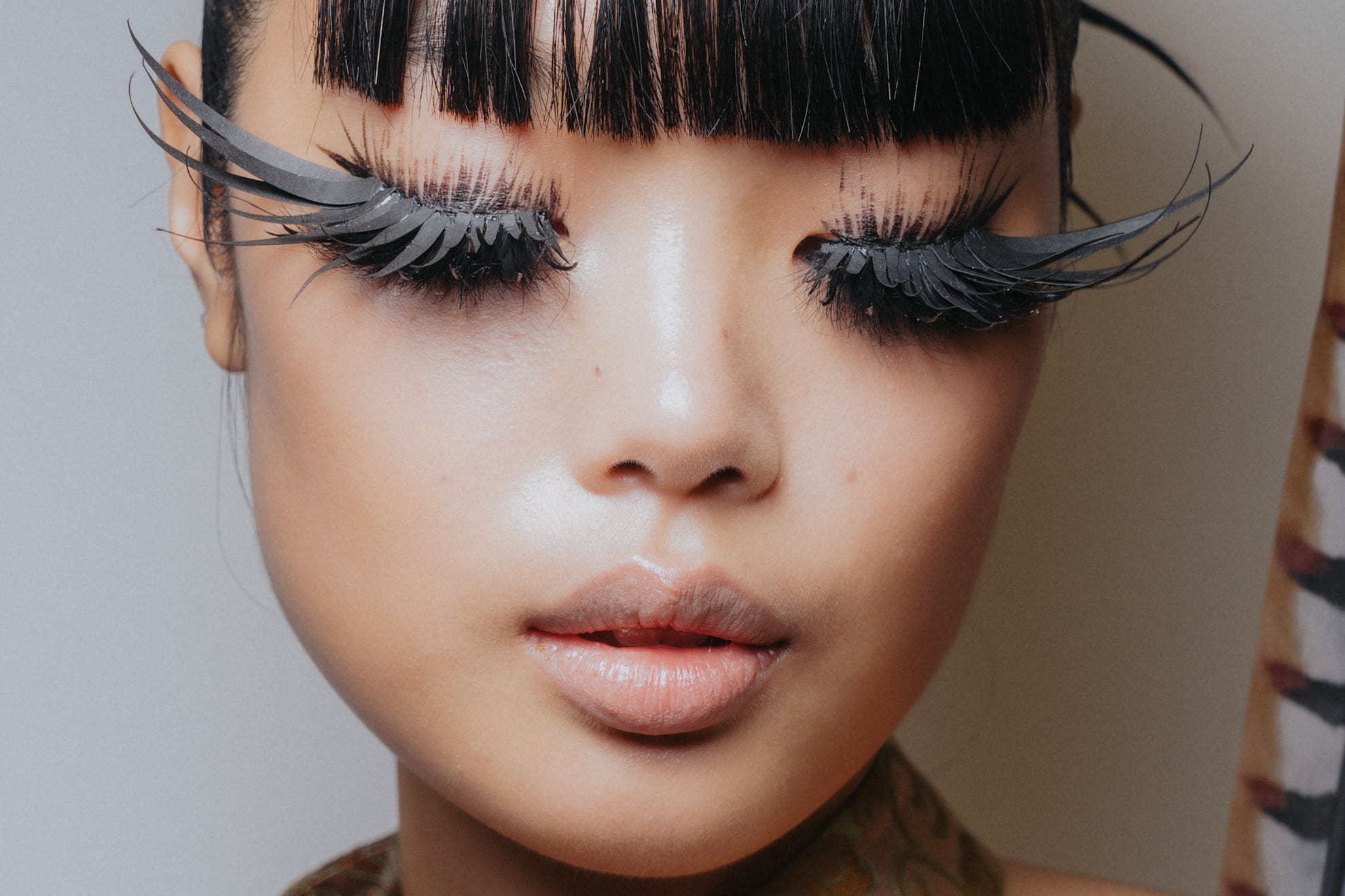 Feathery Lashes at Kim Shui, Orange-Red Lipstick at Michael Kors, and More Makeup Moments You Missed From NYFW
